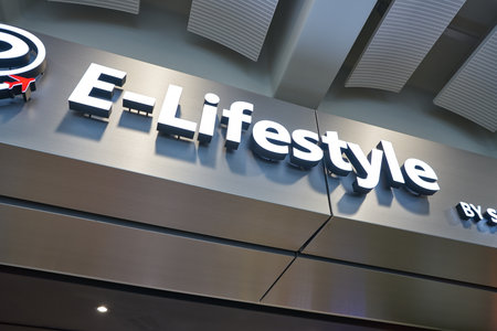 HONG KONG, CHINA - CIRCA APRIL, 2019: E-Lifestyle by Sprint-Cass brand name over a shop entrance in Hong Kong International Airport.のeditorial素材