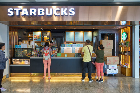 HONG KONG, CHINA - CIRCA APRIL, 2019: Starbucks Coffee Shop in Hong Kong International Airport.のeditorial素材