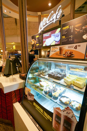 SINGAPORE - CIRCA APRIL, 2019: McCafe at Changi International Airport.のeditorial素材