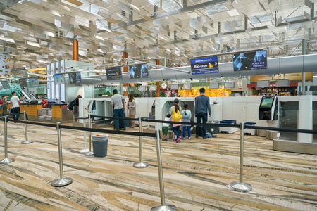 SINGAPORE - CIRCA APRIL, 2019: check-in area at Singapore Changi International Airport, Terminal 3.のeditorial素材