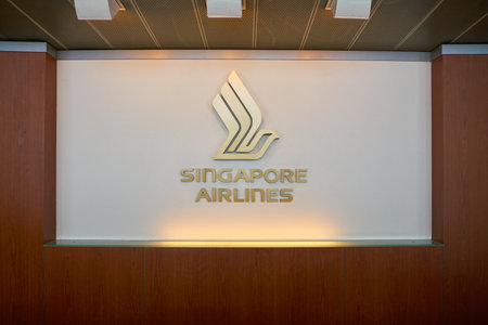SINGAPORE - CIRCA APRIL, 2019: Singapore Airlines sign on a wall at Changi International Airport.のeditorial素材