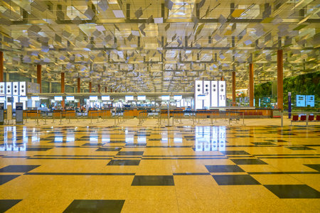SINGAPORE - CIRCA APRIL, 2019: check-in area at Singapore Changi International Airport, Terminal 3.のeditorial素材
