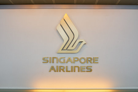 SINGAPORE - CIRCA APRIL, 2019: Singapore Airlines sign on a wall at Changi International Airport.のeditorial素材