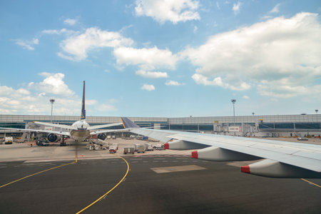 SINGAPORE - CIRCA APRIL, 2019: Changi International Airport seen from Singapore Airlines aircraft in the daytime.のeditorial素材
