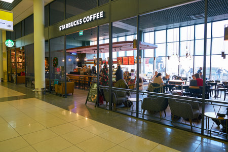 MOSCOW, RUSSIA - CIRCA NOVEMBER, 2018: entrance to Starbucks in Sheremetyevo International Airport.のeditorial素材