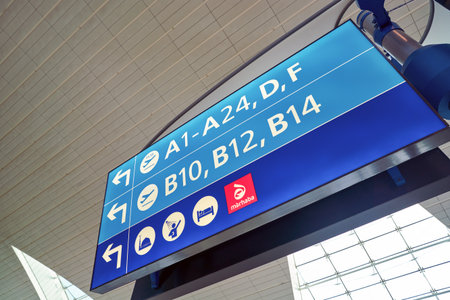 DUBAI, UAE - CIRCA JANUARY, 2019: an information sign seen at Dubai International Airport.のeditorial素材