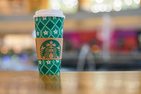 MOSCOW, RUSSIA - CIRCA OCTOBER, 2018: Starbucks paper cup on a table at Afimall in Moscow.のeditorial素材