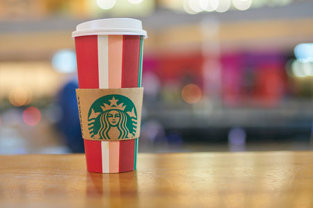 MOSCOW, RUSSIA - CIRCA OCTOBER, 2018: Starbucks paper cup on a table at Afimall in Moscow.のeditorial素材