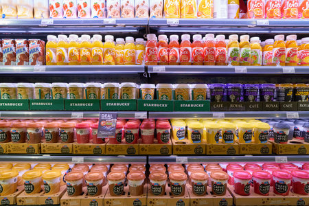 ZURICH, SWITZERLAND - CIRCA OCTOBER, 2018: drinks on display in Migrolino convenience store.のeditorial素材