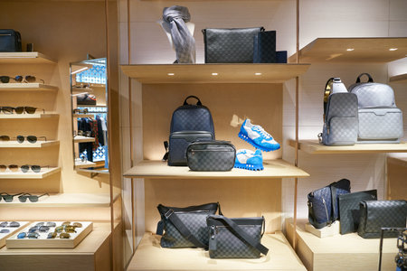 SINGAPORE - CIRCA APRIL, 2019: goods on display at Louis Vuitton store in Changi International...