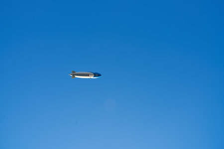 COLOGNE, GERMANY - CIRCA SEPTEMBER, 2018: a dirigible seen in blue sky in Cologne.のeditorial素材