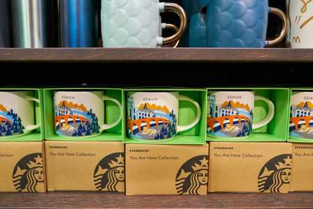 ZURICH, SWITZERLAND - CIRCA OCTOBER, 2018: mugs on display at Starbucks Coffee in Zurich.のeditorial素材