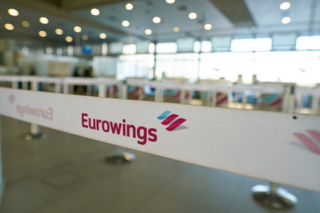 COLOGNE, GERMANY - CIRCA OCTOBER, 2018: Eurowings sign seen on a belt at check-in area in Cologne Bonn Airport.のeditorial素材