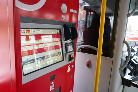 COLOGNE, GERMANY - CIRCA SEPTEMBER, 2018: a ticket machine at a bus in Cologne. A bus is a road...