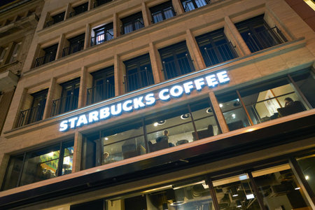 COLOGNE, GERMANY - CIRCA SEPTEMBER, 2018: Starbucks Coffee sign on building in Cologne.