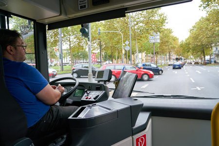 COLOGNE, GERMANY - CIRCA SEPTEMBER, 2018: interior shot of a bus in Cologne. A bus is a road vehicle...