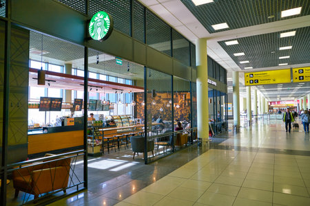 MOSCOW, RUSSIA - CIRCA MAY, 2019: entrance to Starbucks Coffee in Sheremetyevo International Airport.のeditorial素材