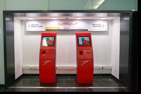 VIENNA, AUSTRIA - CIRCA MAY, 2019: self-service kiosks for baggage tracing at Vienna International Airport.のeditorial素材