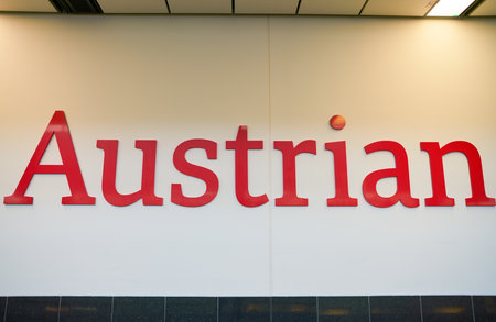 VIENNA, AUSTRIA - CIRCA MAY, 2019: close up shot of Austrian Airlines sign at Vienna International Airport.のeditorial素材