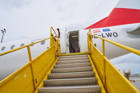 VIENNA, AUSTRIA - CIRCA MAY, 2019: entrance to an aircraft on tarmac at Vienna International...