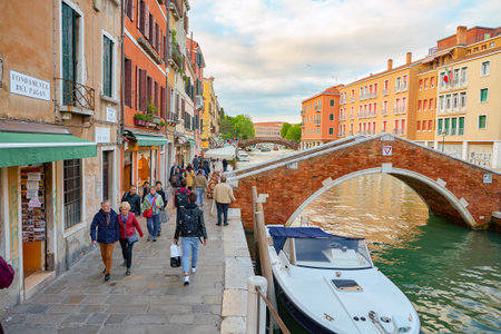 VENICE, ITALY - CIRCA MAY, 2019: view of a bridge over a canal in Venice, Italy.のeditorial素材