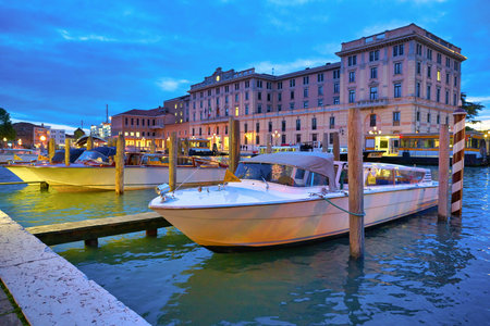 VENICE, ITALY - CIRCA MAY, 2019: boats at their moorings seen in Venice.のeditorial素材