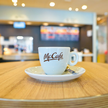 VENICE, ITALY - CIRCA MAY, 2019: white cup with coffee on a table at McCafe in Venice.