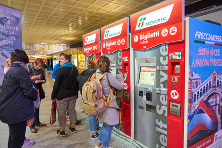 VENICE, ITALY - CIRCA MAY, 2019: self service kiosks at train station in Venice.