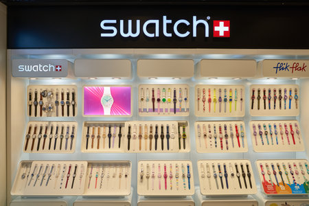 VENICE, ITALY - CIRCA MAY, 2019: goods on display at Swatch watch shop in Venice Marco Polo Airport. Swatch is a Swiss watchmaker.のeditorial素材