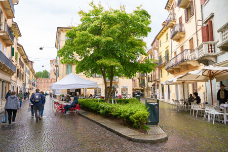 VERONA, ITALY - CIRCA MAY, 2019: a view of a street located in Verona in the daytime.のeditorial素材