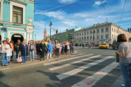 SAINT PETERSBURG, RUSSIA - CIRCA AUGUST, 2017: crowd of people waiting to cross the road in Saint Petersburgのeditorial素材