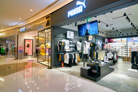 SHENZHEN, CHINA - CIRCA APRIL, 2019: goods on display at Puma store in Shenzhen.のeditorial素材