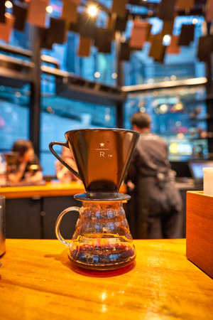 SHENZHEN, CHINA - CIRCA APRIL, 2019: inside Starbucks Reserve Bar in Shenzhen. Starbucks Corporation is an American coffee company and coffeehouse chain.のeditorial素材