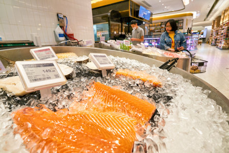 SHENZHEN, CHINA - CIRCA APRIL, 2019: filleted fish on display at Ole' supermarket in MixC Shenzhen Bay shopping mall.のeditorial素材