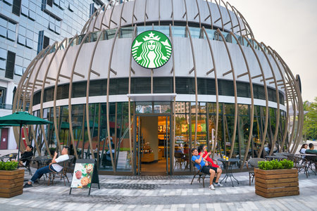 SHENZHEN, CHINA - CIRCA APRIL, 2019: entrance to Starbucks Coffee in Shenzhen. Starbucks Corporation is an American coffee company and coffeehouse chain.のeditorial素材