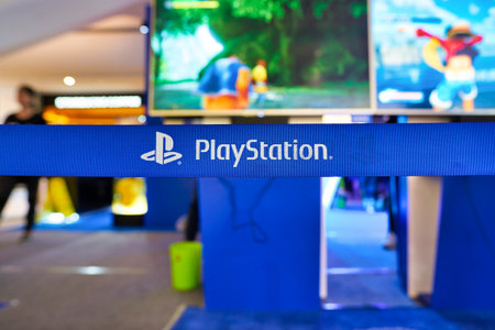 SHENZHEN, CHINA - APRIL 21, 2019: PlayStation sign on a belt at Sony Expo 2019 in UpperHills shopping mall.のeditorial素材