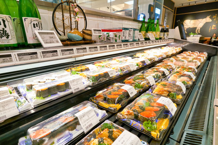 SHENZHEN, CHINA - CIRCA APRIL, 2019: sushi on display at Ole' supermarket in MixC Shenzhen Bay shopping mall.のeditorial素材