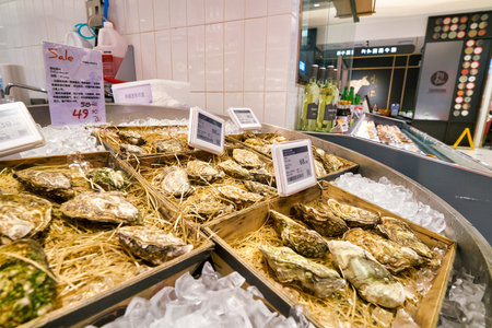 SHENZHEN, CHINA - CIRCA APRIL, 2019: gillardeau oysters on display at Ole' supermarket in MixC Shenzhen Bay shopping mall.のeditorial素材