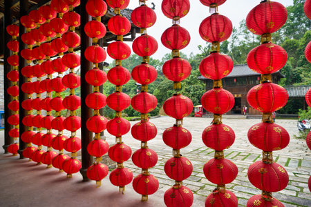 SHENZHEN, CHINA - CIRCA APRIL, 2019: Chinese lanterns decorate a building at Gankeng Hakka Town in Shenzhen. Gankeng Hakka Town is a tourist attraction by OCT Group.のeditorial素材