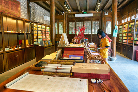 SHENZHEN, CHINA - CIRCA APRIL, 2019: goods on display at Gankeng Hakka Town in Shenzhen. Gankeng Hakka Town is a tourist attraction by OCT Group.のeditorial素材