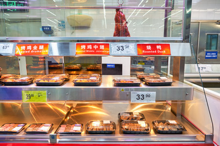 SHENZHEN, CHINA - APRIL 22, 2019: roasted food on display at Sam's Club store in Shenzhen. Sam's Club is an American chain of membership-only retail warehouse clubs owned and operated by Walmart Inc.のeditorial素材