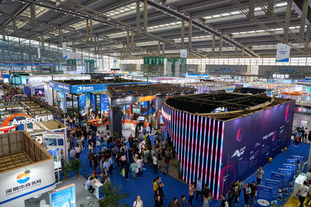 SHENZHEN, CHINA - CIRCA NOVEMBER, 2019: top view of exhibition stands and people at China Hi-Tech...