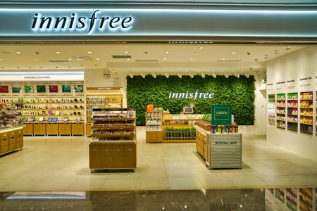 SHENZHEN, CHINA - CIRCA NOVEMBER, 2019: cosmetic products on display at innisfree store in Wongtee Plaza shopping mall. Innisfree is a South Korean cosmetics brand owned by Amore Pacific.のeditorial素材
