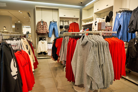 SHENZHEN, CHINA - CIRCA NOVEMBER, 2019: clothing on display in H&M store at Wongtee Plaza shopping...