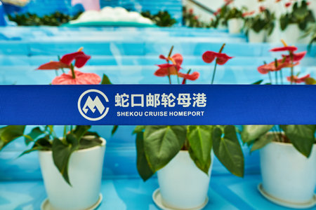 SHENZHEN, CHINA - CIRCA NOVEMBER, 2019: close up shot of Shekou Cruise Homeport sing on a blue belt seen in Shekou Port in Shenzhen.のeditorial素材