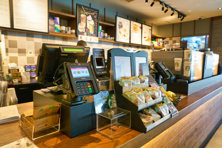 SINGAPORE - CIRCA APRIL, 2019: cash register and payment terminal at Starbucks Coffee in Singapore.