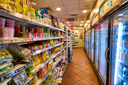 SINGAPORE - CIRCA APRIL, 2019: interior shot of 7-Eleven convenience store in Singapore. A convenience store is a small store that stocks a range of everyday items.のeditorial素材