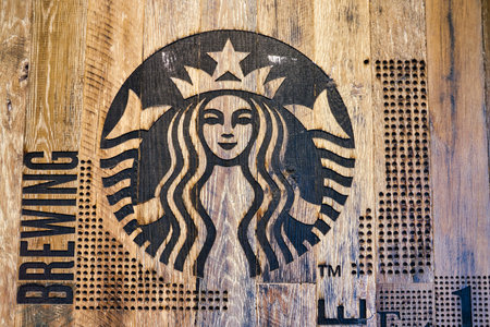 SHENZHEN, CHINA - CIRCA FEBRUARY,  2019: Starbucks Siren sign seen at coffee shop in Shenzhen.