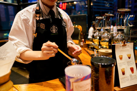 SHENZHEN, CHINA - CIRCA FEBRUARY,  2019: barista prepare coffee at Starbucks Reserve in Shenzhen.のeditorial素材