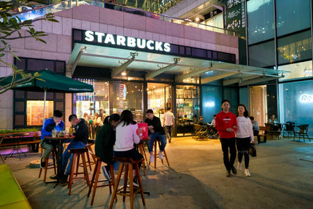 SHENZHEN, CHINA - CIRCA FEBRUARY,  2019: people sit at Starbucks in Shenzhen.のeditorial素材